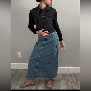 Denim jacket with hoodie sweater material sleeves